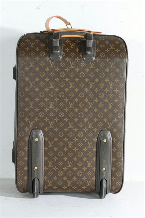 louis vuitton pull along case|louis vuitton rolling suitcase.